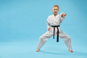 female-teenager-standing-stance-punching-studio